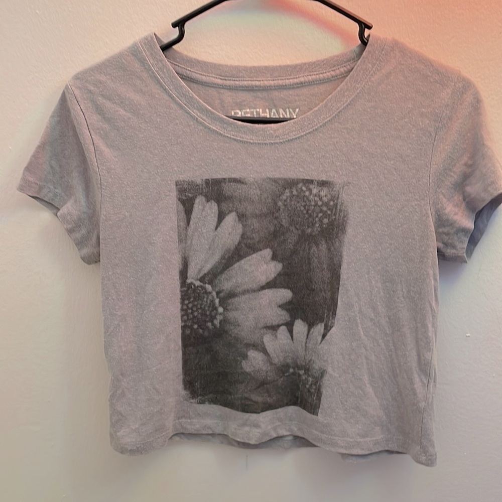 Grey flower top. Good condition- could use an iron
